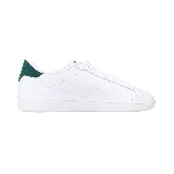 Championes Puma Smash 3.0 L de cuero blanco con detalles en verde oscuro en el talón y logo dorado en el lateral.