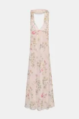 Vestido largo de fiesta con estampado floral en tonos pastel, escote en V, tirantes finos ajustables, espalda descubierta con lazada y fular integrado.