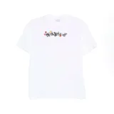 Camiseta blanca de corte oversize con estampado frontal que simula la palabra "Off-White" formada por elementos florales y un dibujo de bicicleta.