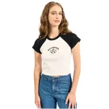 Remera corta Billabong de manga corta ranglan, con cuerpo color crema y mangas negras. Estampado frontal con el logo de la marca.