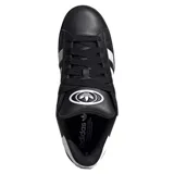 Championes de cuero negro con detalles en blanco y suela de goma.