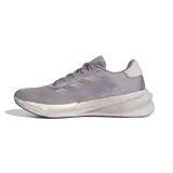 Championes de running Adidas Supernova Stride, color lila con detalles plateados y suela blanca.