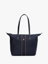 Bolso tote azul marino de nailon con cierre de cremallera, doble asa superior, bolsillo interior con cremallera, dos bolsillos interiores abiertos e insignia del monograma TH en la parte delantera.