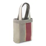 Bolsa matera de tela canvas combinada con división interna para organizar termo y mate. Incluye asa corta de mano.