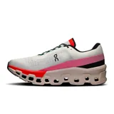 Championes de running On Cloudmonster 2, color blanco con detalles en negro, rojo y rosa.