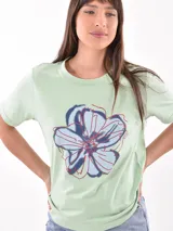 Remera blanca de algodón con estampado de limones y texto en azul.