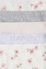 Pack de siete pares de soquetes de algodón en colores lisos y estampados florales.