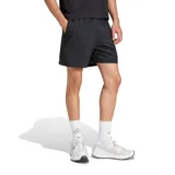 Bermuda deportiva negra de poliéster con bolsillos laterales tipo cargo y logo de Adidas en blanco.