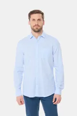 Camisa de lino blanca de manga larga, con bolsillo en el pecho con logo bordado y botones personalizados.