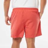 Short de baño liso color coral, con cintura elástica y cordón ajustable.