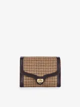 Cartera de lana jacquard con detalles en piel, solapa plegable y bandolera de cinta jacquard.