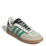 Championes Adidas Breaknet Sleek color crema con detalles en verde y suela marrón.