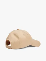Gorra de béisbol color beige, de algodón, con logo de Tommy Jeans bordado en el frente y hebilla ajustable en la parte trasera.