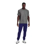 Pantalón de jogging Under Armour Sportstyle Tricot color azul petróleo, de corte ajustado, con cintura elástica ajustable con cordón y bolsillos laterales.