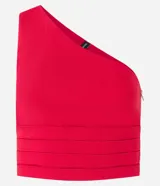 Blusa cropped de bengalina color celeste, con escote de un solo hombro, bretel ancho, cierre lateral y recortes en la cintura.