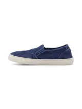 Zapatillas slip-on azules de algodón orgánico con suela de caucho natural.