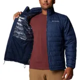 Campera puffer Columbia Powder Lite II, color verde oliva en la parte superior y verde claro en la parte inferior. Con cierre frontal, cuello alto, bolsillos laterales con cierre y logo de la marca bordado en el pecho.