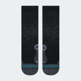 Medias deportivas Stance negras con detalles en gris y celeste.