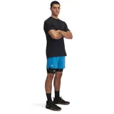 Short deportivo Under Armour Vanish Woven de hombre, color celeste con calza interior negra y logo estampado en la pierna izquierda.
