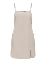 Vestido mini color beige con breteles finos y escote cuadrado.