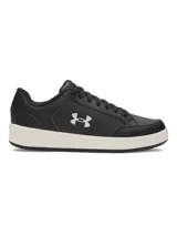 Championes Under Armour para mujer, color negro con logo celeste en el lateral y suela color crema. Calzado ligero, transpirable y cómodo para uso diario.