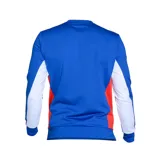 Buzo deportivo azul con detalles en rojo y blanco, con logo de Umbro y escudo del Club Nacional de Football.