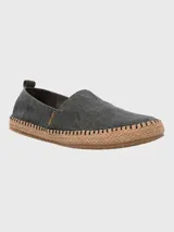 Alpargata de lona color gris con suela de yute y ajuste elástico.