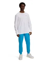 Pantalón de jogging Under Armour Sportstyle Tricot color azul petróleo, de corte ajustado, con cintura elástica ajustable con cordón y bolsillos laterales.
