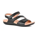 Sandalias bajas color piel con tiras de cuero texturizado y ajuste con velcro.
