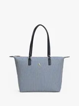 Cartera tote de lona con rayas verticales azules y blancas, doble asa superior negra, cierre de cremallera y logo de Tommy Hilfiger en el frente.
