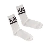 Par de medias blancas y negras con logo Kaboa en la parte superior y una franja horizontal.