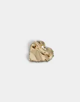 Broche prendedor con forma de corazón, recubierto de strass negros y plateados.