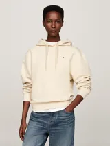 Buzo color crema de Tommy Hilfiger, con capucha ajustable con cordón, mangas largas y logo bordado en el pecho.