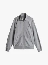 Buzo Tommy Hilfiger de felpa gris con cuello chimenea, cierre de cremallera frontal, bolsillos tipo canguro, puños y bajo de punto canalé, logo bordado en el pecho y corte regular.