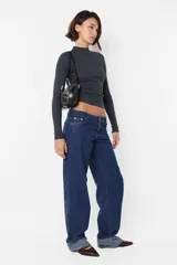 Top de morley manga larga gris, al cuerpo; largo camiseta.