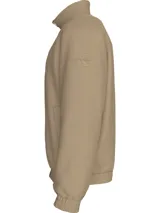 Campera color beige con cierre frontal y cuello alto. Logo de la marca en el pecho.