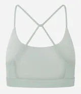 Top deportivo negro confeccionado en microfibra sin estampa, con espalda abierta y breteles finos cruzados.