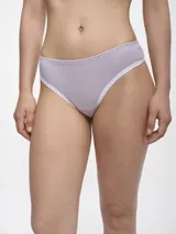 Colaless de algodón color verde agua con ribete blanco.