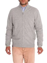 Sweater celeste de punto con cuello alto y cierre frontal completo.