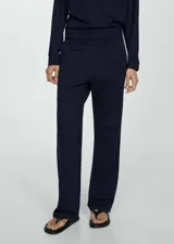 Pantalón de jogging azul marino de tiro alto con cintura elástica, bolsillos laterales y corte recto.