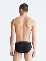 Slip negro Calvin Klein 1996 de microfibra con logo estampado en toda la prenda y cintura elástica distintiva.