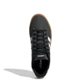 Championes Adidas Daily 4.0, color negro con detalles en blanco y suela marrón.
