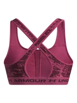 Top deportivo Under Armour con estampado floral en tonos rosa y amarillo sobre fondo negro. Cuenta con tirantes cruzados en la espalda y banda elástica con el logo de la marca en el contorno inferior.
