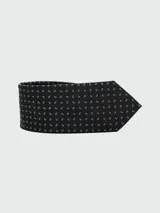 Corbata negra con micro estampado geométrico en celeste.
