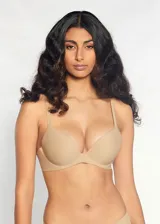 Soutien color piel de microfibra sin costuras, con push up, aro invisible y breteles regulables.