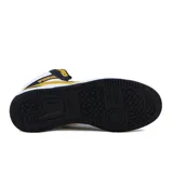 Championes de caña media Puma Rebound V6, color blanco con detalles en negro y amarillo mostaza.