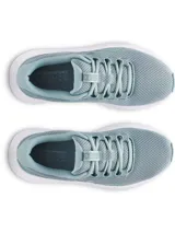 Championes de running Under Armour Charged Surge 4 color celeste con logo de la marca en el lateral.