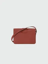 Cartera bandolera Longchamp modelo Box Trot, tamaño mediano, color blanco hueso, con correa ajustable, cierre con solapa y broche metálico dorado con el logo de la marca.