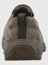 Zapato slip-on de cuero marrón Hush Puppies modelo Tornnado, con suela de goma.