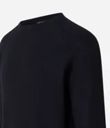 Suéter negro de algodón con cuello redondo y textura de punto.